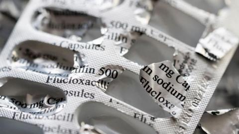 A foil-covered tablet packet with lots of empty pockets