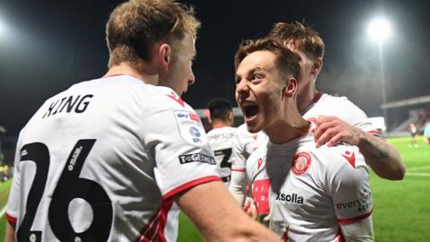 Dan Kemp celebrates scoring late on for Stevenage 