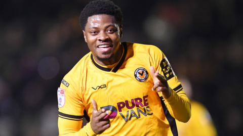 Newport County's Bobby Kamwa celebrates