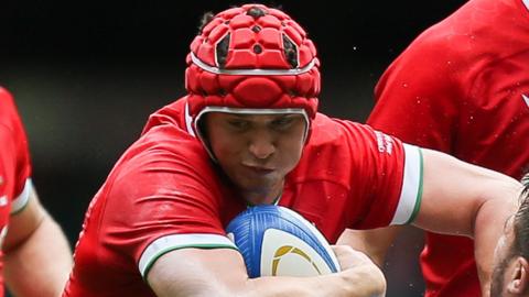 James Botham attacks for Wales