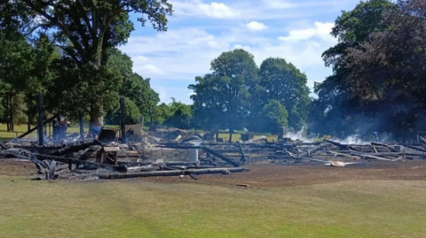 Heathcoat Cricket Club's wooden pavilion after fire