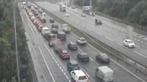 queue of vehicles on M62