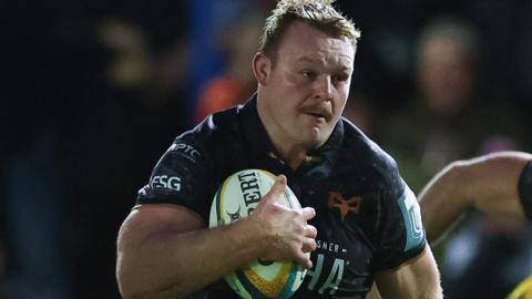 Dewi Lake in action with ball in hand for Ospreys