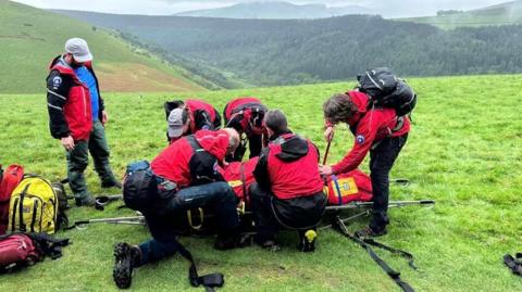 The rider receiving treatment at the scene