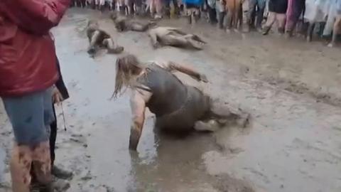 People in the mud at Tramlines