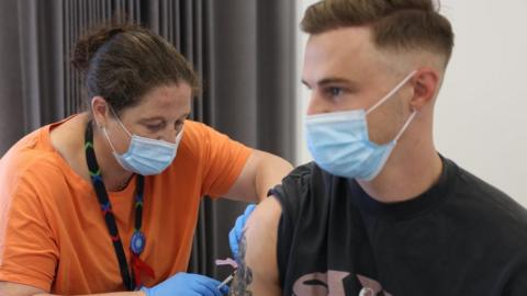 A man being vaccinated