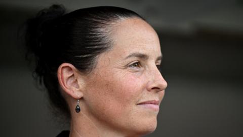 Rhian Wilkinson in the dugout
