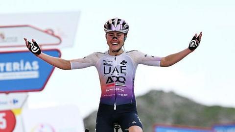 Overall race winner Paula Blasi of Spain and UAE Team ADQ celebrates at finish line
