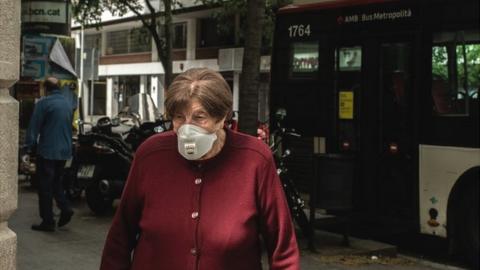 Woman in Spain wearing a mask during the coronavirus pandemic, 2 May 2020