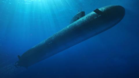 Artists impression of a large nuclear submarine, submerged and travelling through the ocean