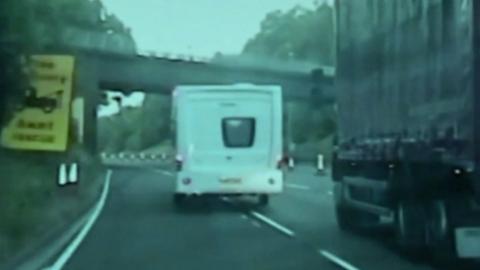 A man has been jailed after leading police on a 40 mile pursuit while towing a stolen caravan.