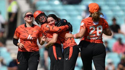 Kate Cross and Sunrisers Leeds celebrate a wicket v Southern Brave