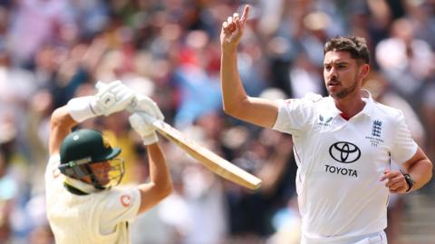 England's Josh Tongue celebrates taking the wicket of Marnus Labuschagne