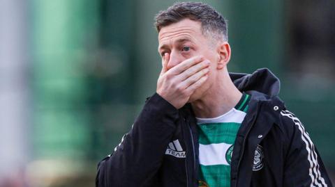 Callum McGregor looks dejected after the full-time whistle