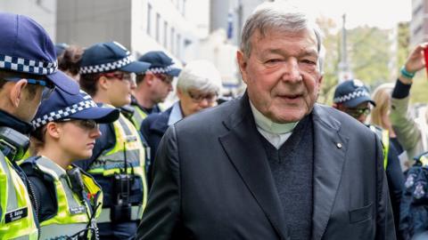 Cardinal George Pell outside the Melbourne Magistrates Court during a court hearing in 2017