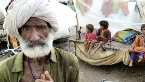 A man affected by flooding in Pakistan