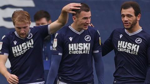 Millwall celebrate Grant Hall's own-goal created by Jed Wallasce