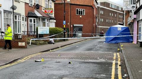 A blue police tent at the scene of the crash in Erdington