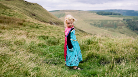 Dan's daughter Megan, aged four at the time, is photographed overlooking the Bwlch mountain