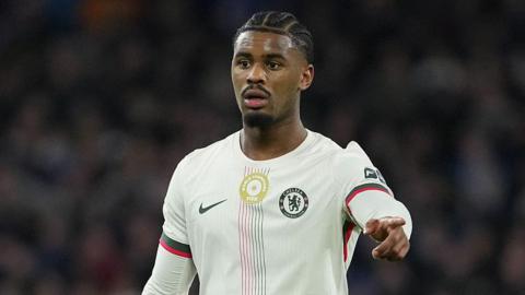 Jorrel Hato pointing while playing for Chelsea against Cardiff City in the Carabao Cup