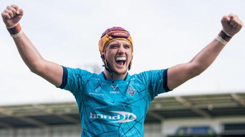 George Flanagan celebrates for Huddersfield Giants