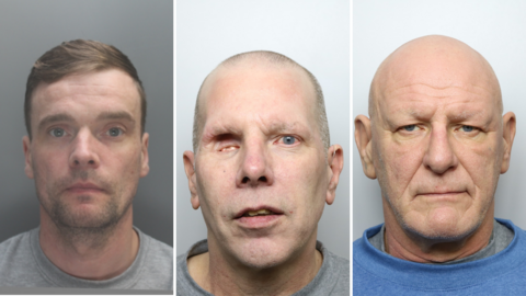 A composite arrangement of three separate mugshots placed side by side against a plain, light-coloured background.
Fellows has short, neatly styled hair and is wearing a light grey top. He is facing directly forward toward the camera, with a neutral posture.
In the centre of the image,Newell is positioned in a similar head-and-shoulders format. He has very short or closely cropped hair. One of his eyes appears to be missing.
Taylor has no visible hair on the head and is wearing a blue top. He is again facing forward toward the camera.
