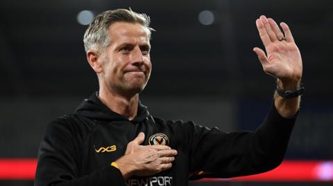 Newport boss David Hughes celebrates victory at Cardiff