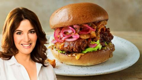 Nigella Lawson edited on to an image of a fried chicken sandwich.