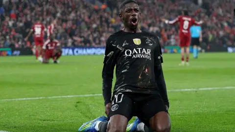 Liverpool bus arrives amid red flare smoke