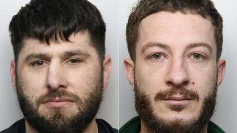 Two side by side police mugshots. Both have beards and moustaches, brown hair, and neutral expressions. Gjonaj, left, is squinting slightly and has brown eyes. His hair is slightly darker. Zefi has a neutral expression and green eyes.