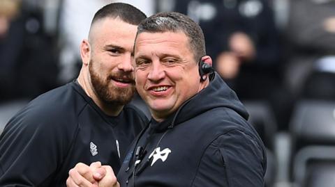 Back row Morgan Morris and former Ospreys head coach Toby Booth