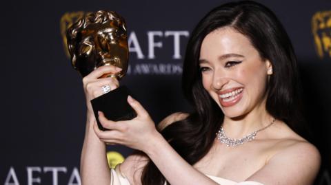 Mikey Madison poses in the press room after winning the Best Actress award for 'Anora' during the BAFTA Film Awards at the Royal Festival Hall in London, Britain, 16 February 2025