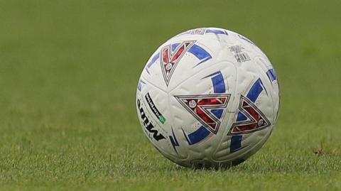 National League football on a grass pitch