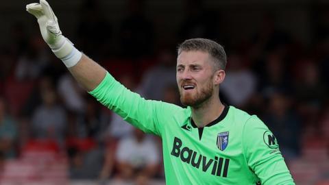 Jake Turner in action for Gillingham