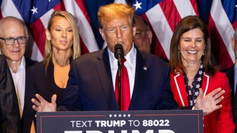 Former US President Donald Trump (C) speaks after defeating former governor Nikki Haley in South Carolina's Republican presidential primary in Columbia, South Carolina, USA, 24 February 2024. Though Trump defeated Haley handily, she is vowing to stay in the primary race.
