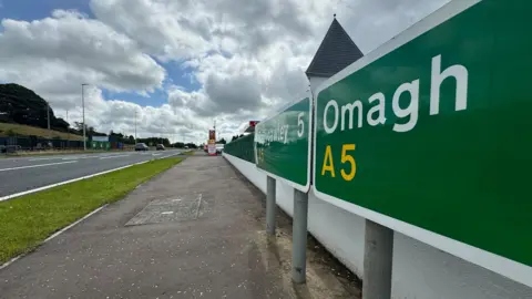 Sign pointing towards Omagh and Ballygawley on the A5 road in County Tyrone.