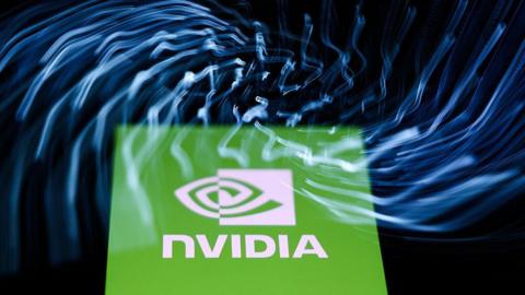 A laptop keyboard and Nvidia logo displayed on a phone screen are seen in this multiple exposure illustration photo 