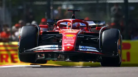 Red Bull's Max Verstappen ahead of Ferrari's Charles Leclerc during third practice at Imola