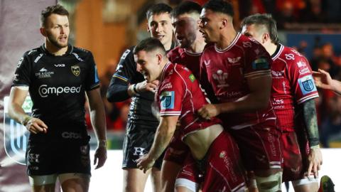 Dane Blacker celebrates