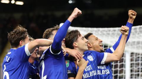 Cardiff City players celebrate in their EFL Cup win at Burnley 