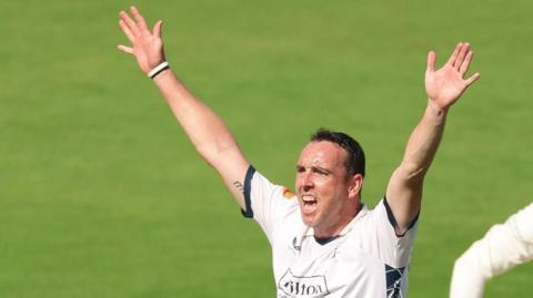 Kyle Abbott celebrates