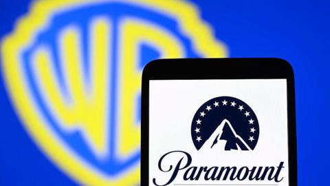 a photo showing WB's logo and Paramount's logo 