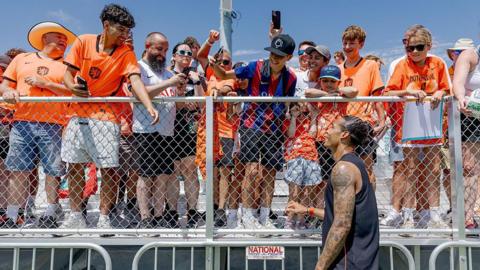 Virgil Van Dijk greeting fans ahead of Netherlands' first World Cup game