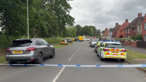 A cordon across a residential road