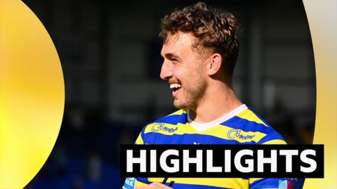 Sam Powell smiles next to the word highlights