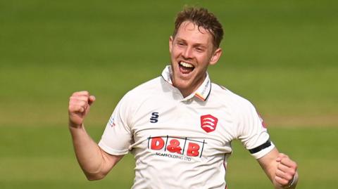 Jamie Porter celebrates taking wicket for Essex