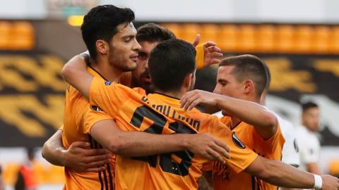 Wolves players celebrate beating Olympiakos