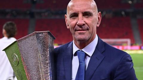 Monchi with the Europa League trophy