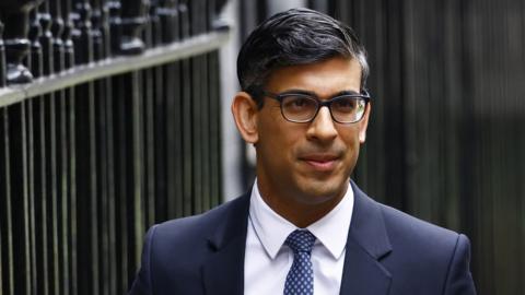 Rishi Sunak outside the gates of Downing Street