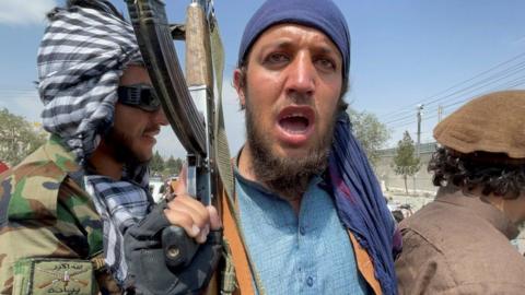 Taliban forces patrol near the entrance gate of Hamid Karzai International Airport, a day after U.S troops withdrawal, in Kabul, Afghanistan August 31, 2021.